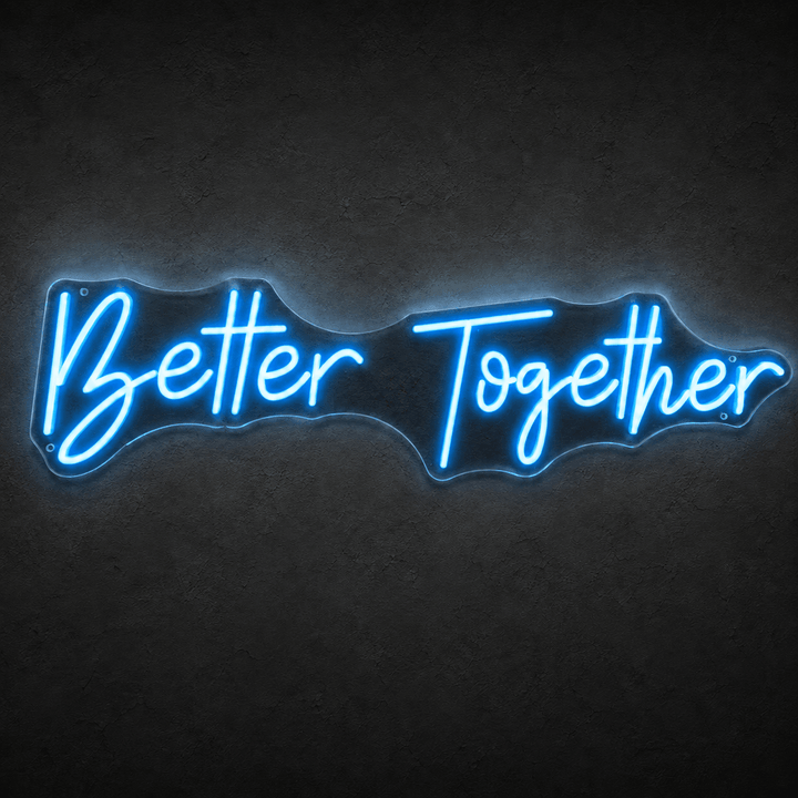 Better Together LED neon sign glowing light blue on clear acrylic backing against a dark wall.