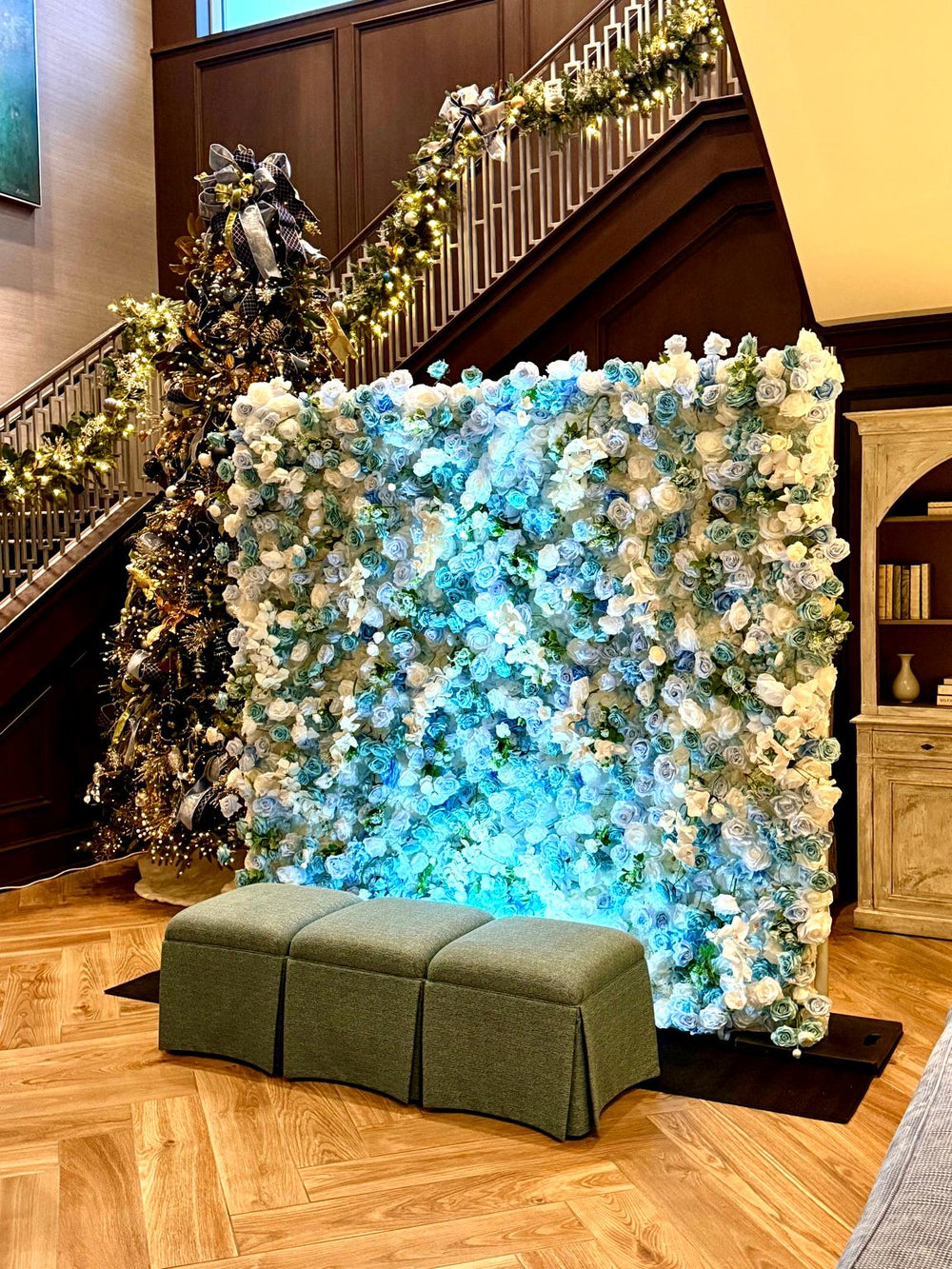 Blue and white flower wall for sale displayed at a high end corporate event at a hotel.